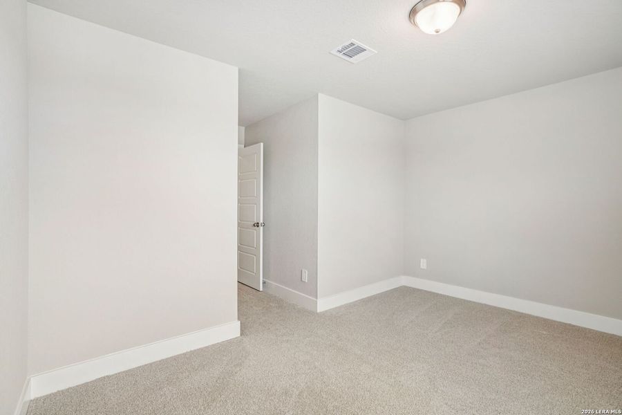 Spacious, unfurnished interior of a new home in Legendary Trails - Premier Series, Cibolo (Image 42).