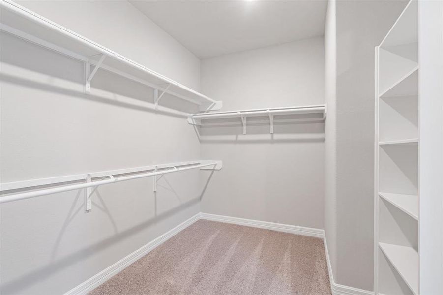 A view of your large primary walk-in Closet