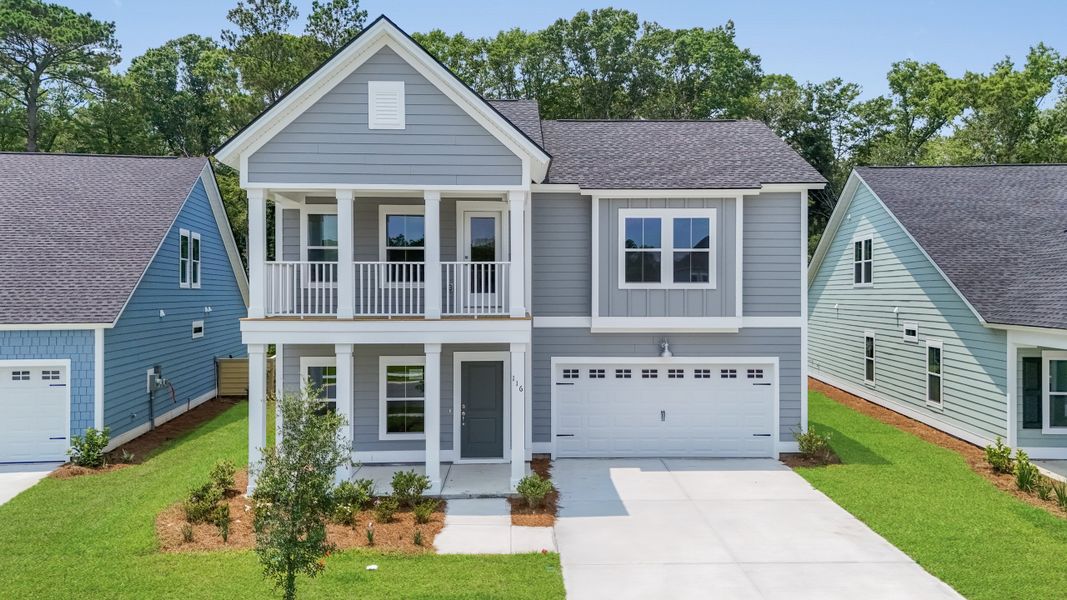 Front exterior of a new home in Savannah Quarters, Pooler, GA, highlighting curb appeal (Image 1). Front exterior of a new home in Savannah Quarters, Pooler, GA, highlighting curb appeal (Image 1).