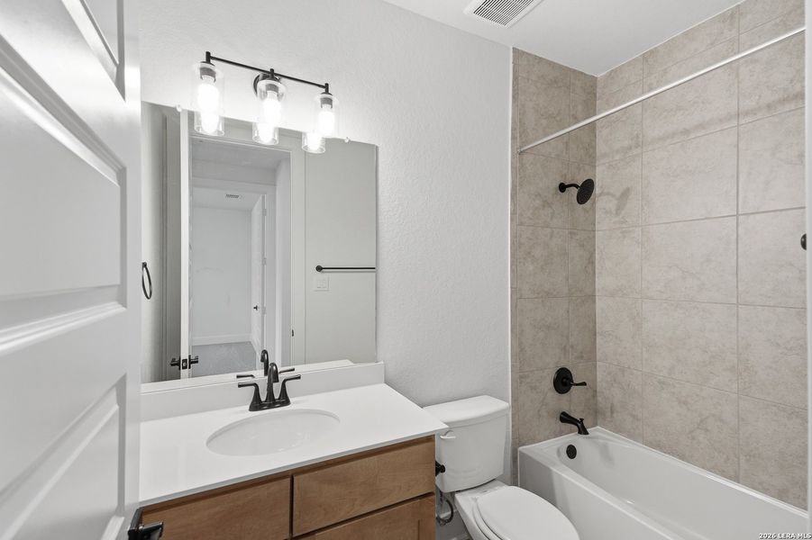 Furnished interior view inside a new home in The Reserve at Potranco Oaks, Castroville (Image 18).