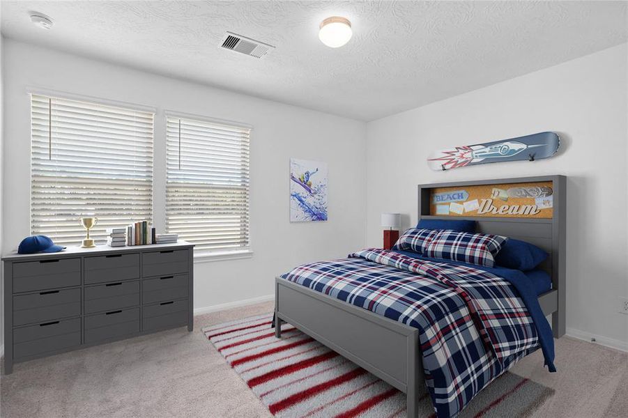 Secondary bedroom features plush carpet, neutral paint, lighting, large windows with privacy blinds and ample sized closet space.