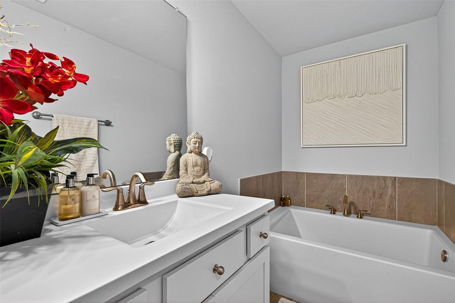 Furnished interior view inside a new home in Sunterra, Katy (Image 4).