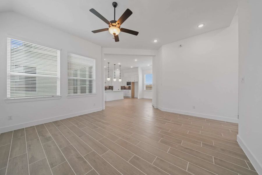 Representative unfurnished interior of a home built from the Augusta by Chesmar Homes in Riceland Alley Loads, Mont Belvieu (Image 15).