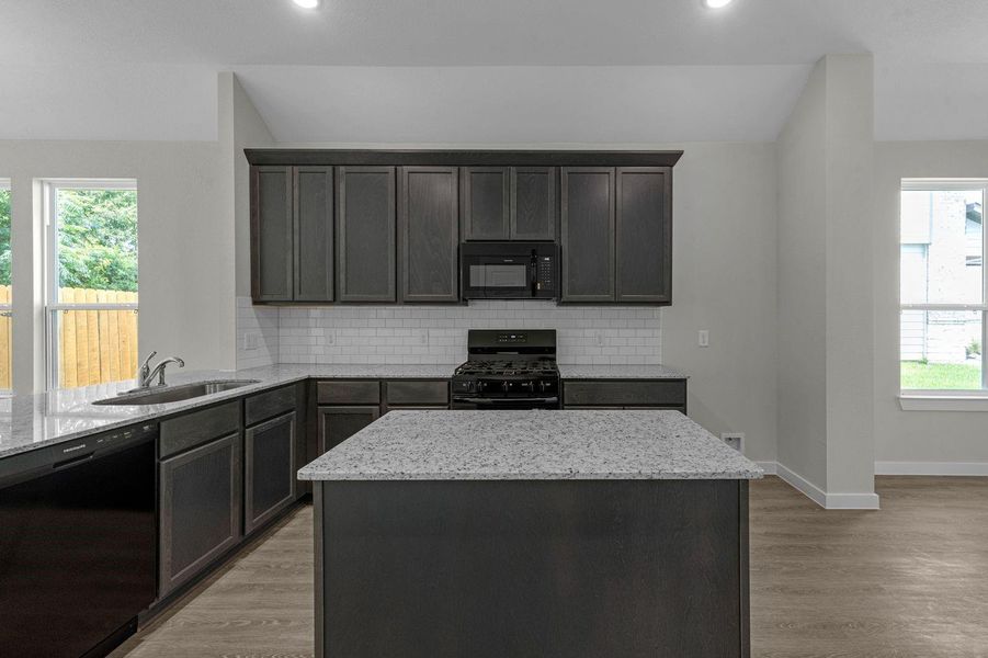 Furnished interior view inside a new home in Lexington Heights, Willis (Image 5).