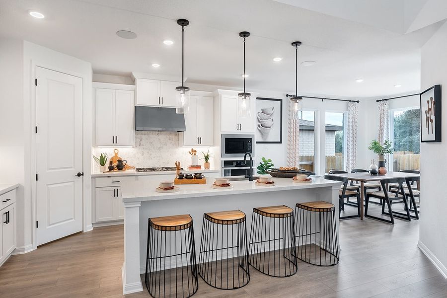 Representative furnished interior of a home built from the Saffron by Taylor Morrison in Travisso, Leander (Image 3).