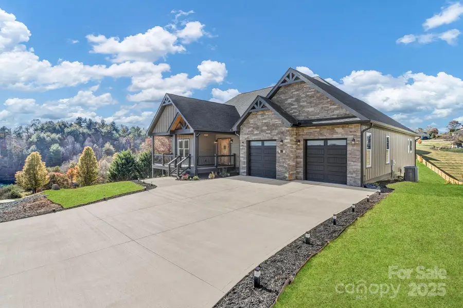 Front exterior of a new home in , Alexander, NC, highlighting curb appeal (Image 1). Front exterior of a new home in , Alexander, NC, highlighting curb appeal (Image 1).
