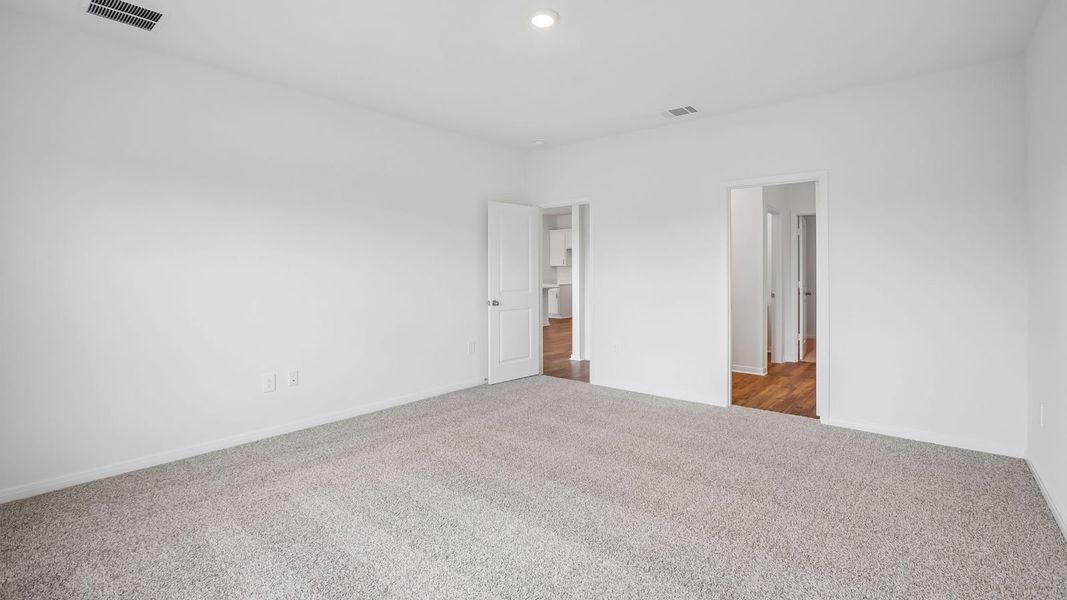 Spacious, unfurnished interior of a new home in Prairie Lakes, Buda (Image 32).