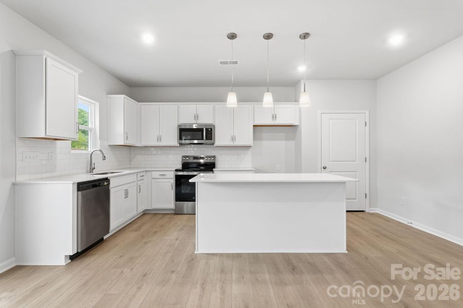 Furnished interior view inside a new home in Piper Creek, Newton (Image 7).