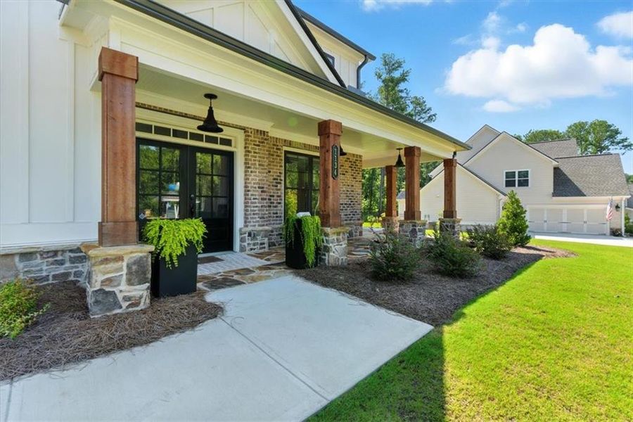 Exterior details and patio area of a home in Ford Landing, Acworth (Image 2).