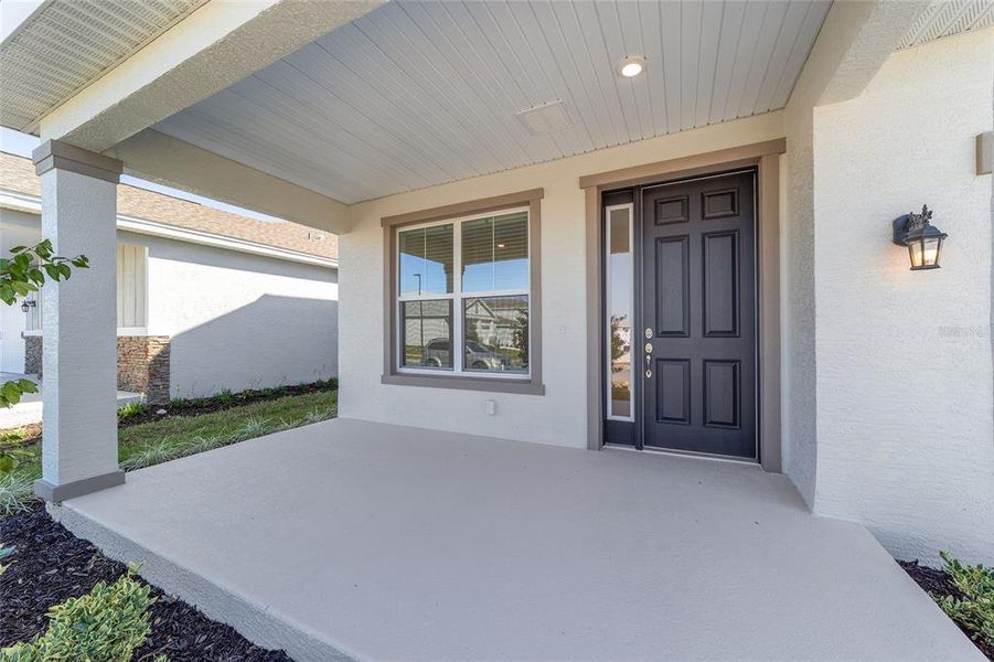 Exterior details and patio area of a home in Calesa Township, Ocala (Image 3).