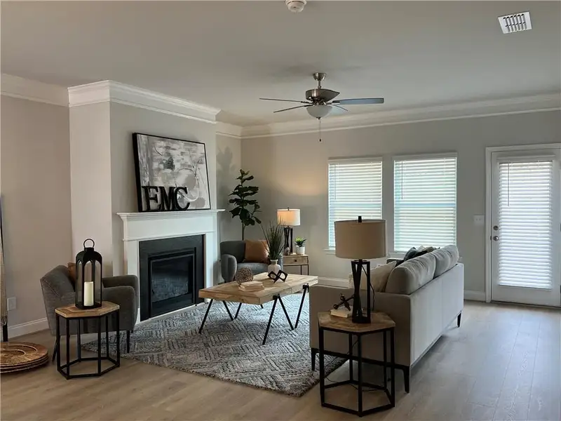 Furnished interior in a model home at The Village at Maple Street in Dawsonville (Image 3).