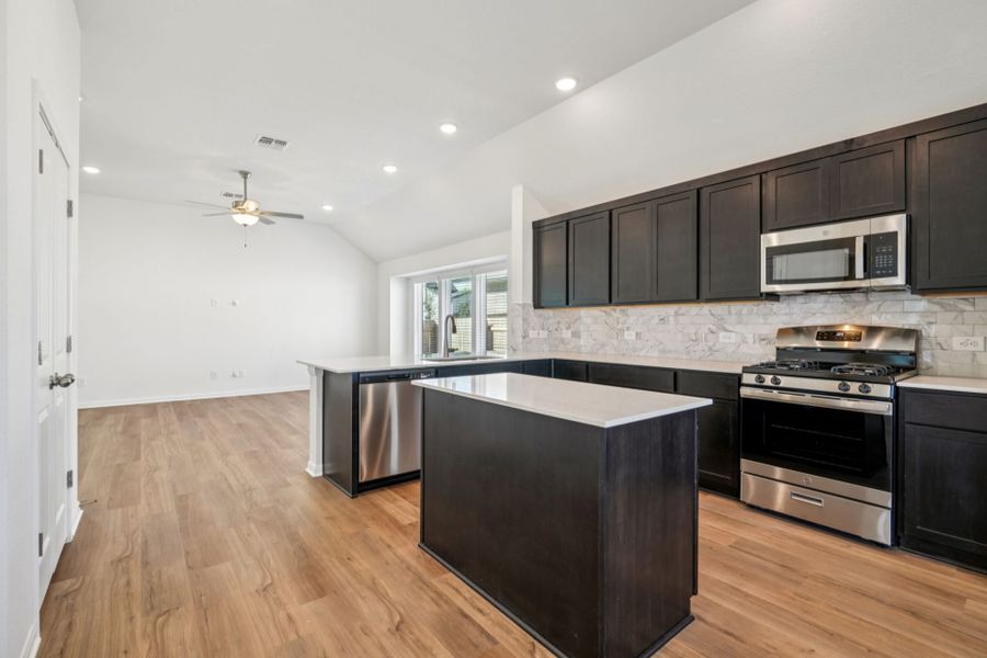 Furnished interior view inside a new home in Village at Three Oaks, Seguin (Image 8).