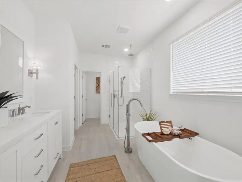 Luxurious primary bath (*Photo not of actual home and used for illustration purposes only.)