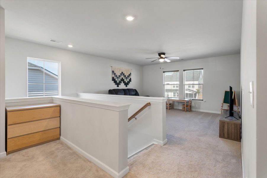 Furnished interior view inside a new home in Sweetgrass at Summers Corner, Summerville (Image 36).