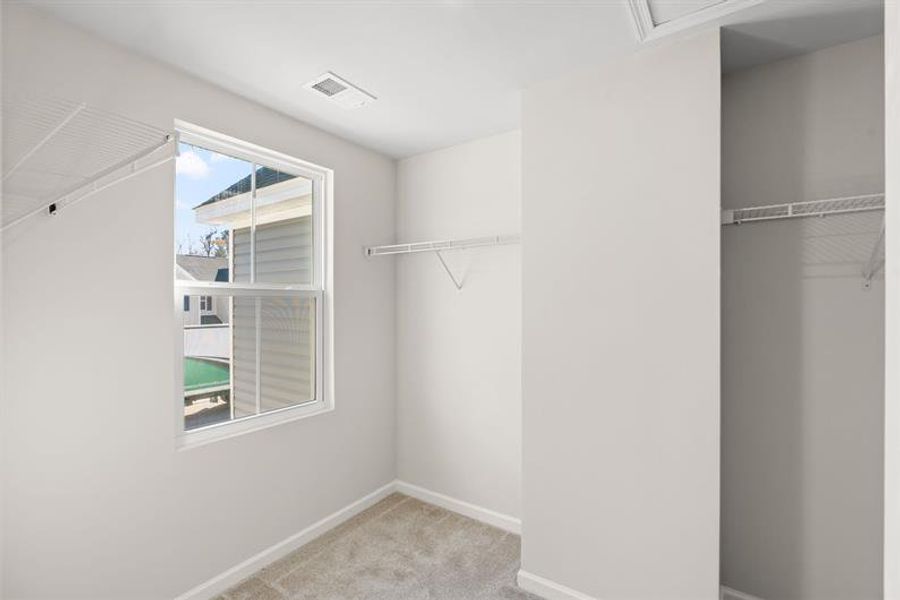 Spacious, unfurnished interior of a new home in Meadows Edge, Conway (Image 18).