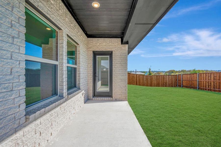 Exterior details and patio area of a home in Aspire at Noble Ridge, Howe (Image 3).