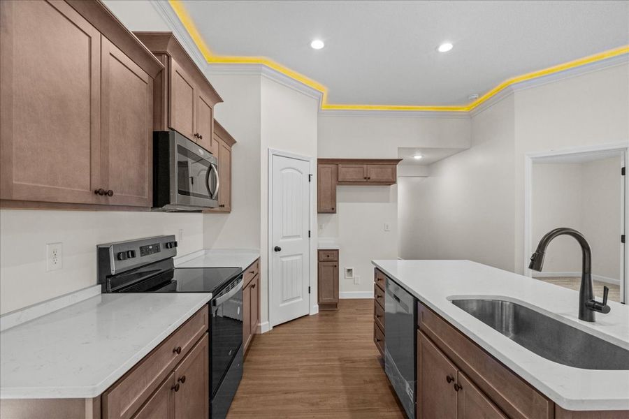 Representative furnished interior of a home built from the Cheshire by Enchanted Homes in Hampshire Heights, Moore (Image 5).