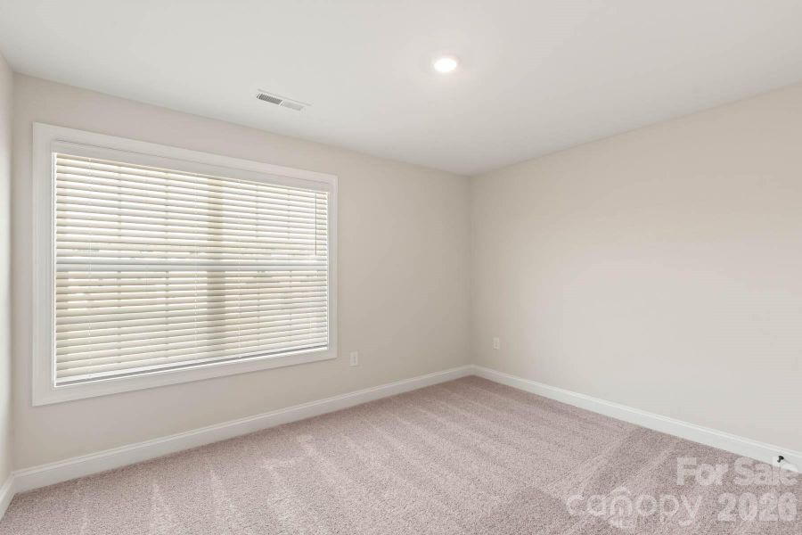 Spacious, unfurnished interior of a new home in Colonial Crossing, Troutman (Image 12).