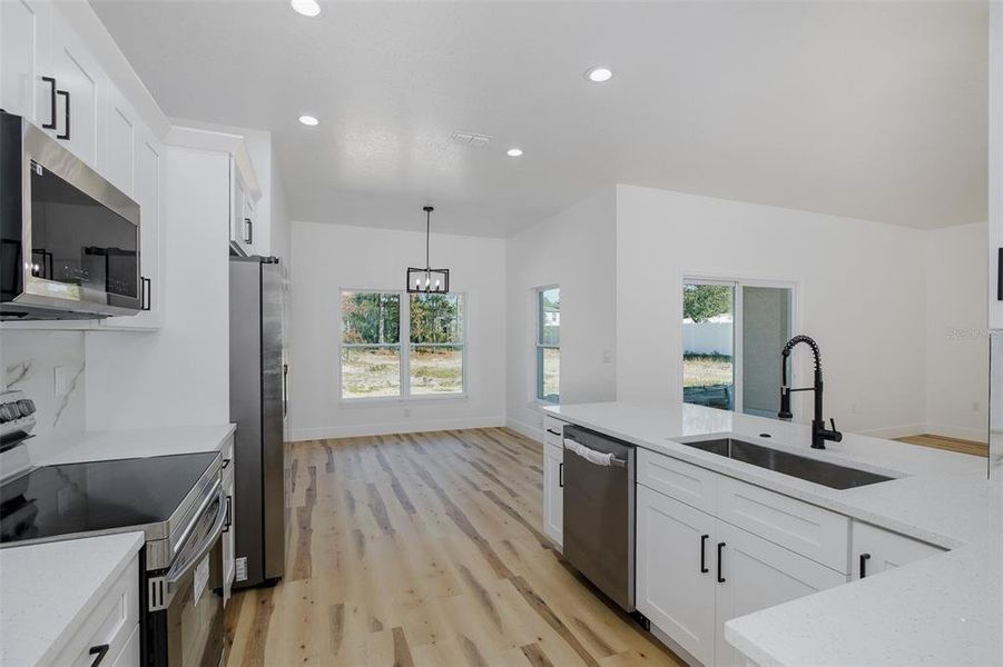 Furnished interior view inside a new home in , Weeki Wachee (Image 19).