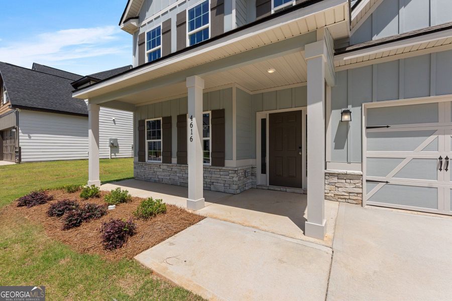 Front exterior of a new home in Juliette Crossing, Forsyth, GA, highlighting curb appeal (Image 28).
