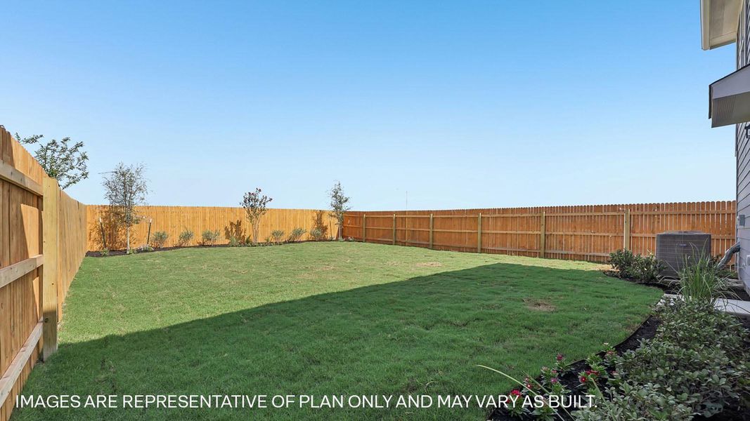 Exterior details and patio area of a home in Marigold, Kyle (Image 14).