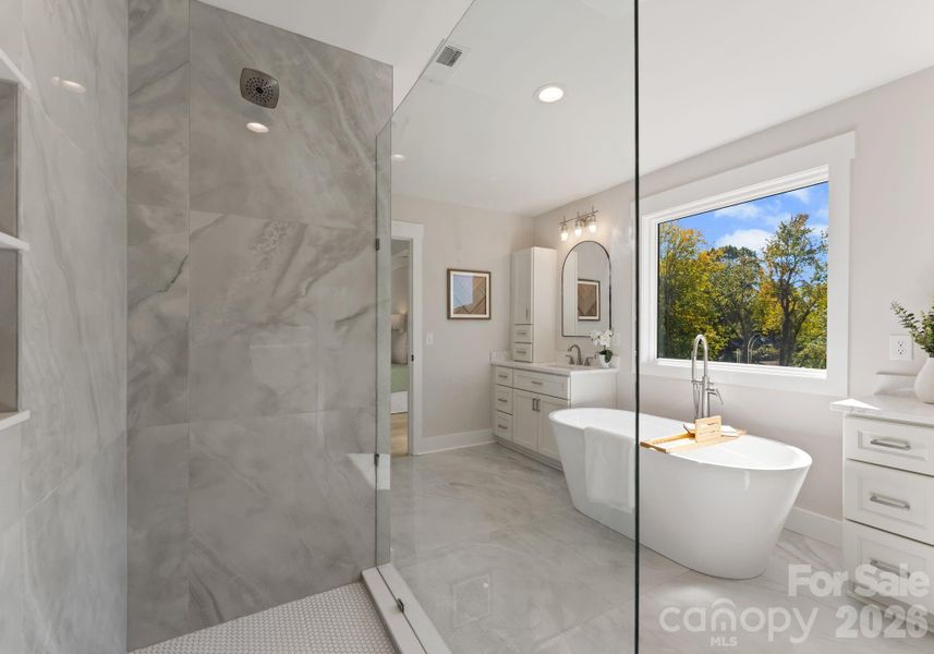 Primary Bathroom with Soaking Tub and Large Tiled Shower