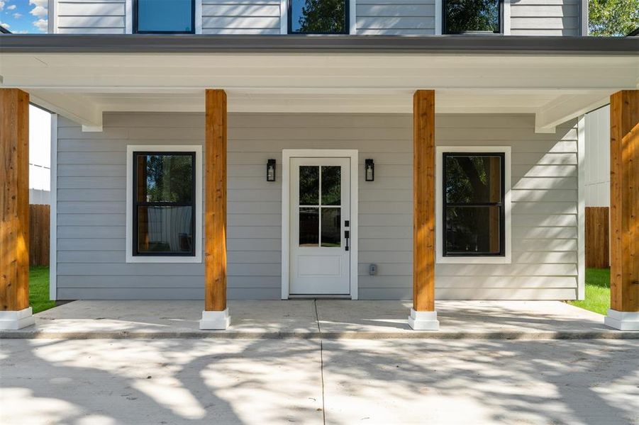 Property entrance with covered porch Property entrance with covered porch