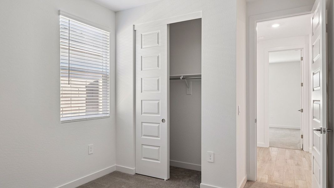 Representative unfurnished interior of a home built from the Hayden by D.R. Horton in The Ridge at Stone Butte, Phoenix (Image 20).