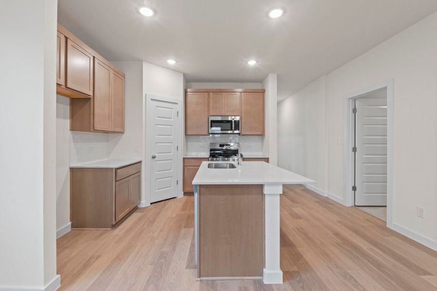 Kitchen in the Pearl home plan by Trophy Signature Homes – REPRESENTATIVE PHOTO Kitchen in the Pearl home plan by Trophy Signature Homes – REPRESENTATIVE PHOTO
