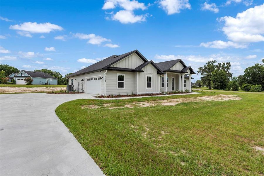 Front exterior of a new home in , Lake City, FL, highlighting curb appeal (Image 1). Front exterior of a new home in , Lake City, FL, highlighting curb appeal (Image 1).