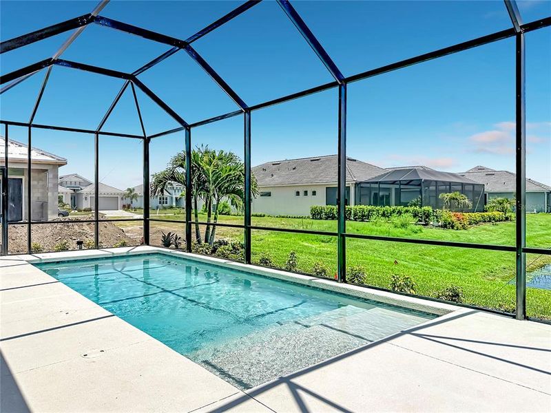 Exterior details and patio area of a home in Watercolor Place, Bradenton (Image 22).