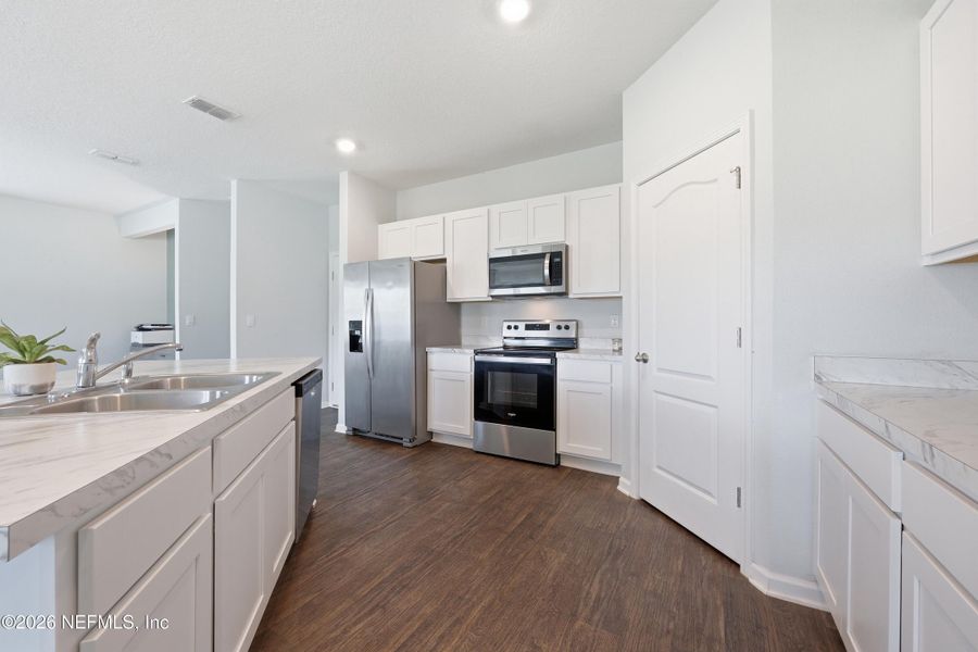 Furnished interior view inside a new home in Ravenswood Village, St. Augustine (Image 8).