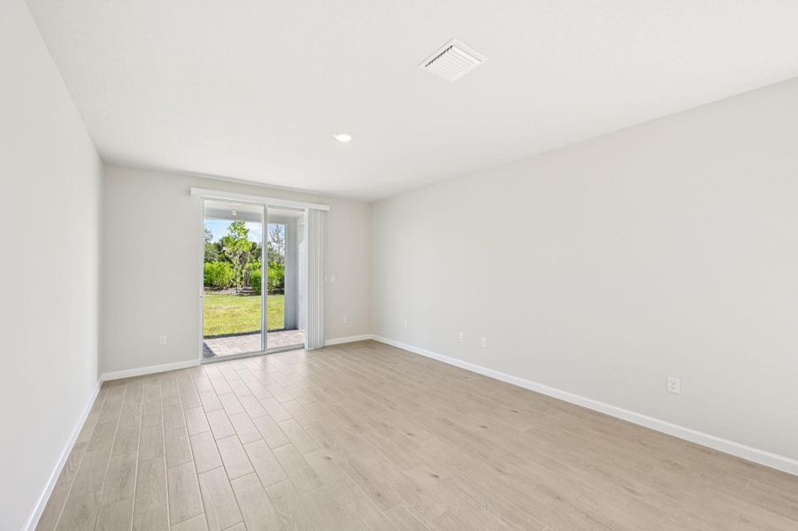 Spacious, unfurnished interior of a new home in Hampton Park - Classic Series, Vero Beach (Image 11). Spacious, unfurnished interior of a new home in Hampton Park - Classic Series, Vero Beach (Image 11).