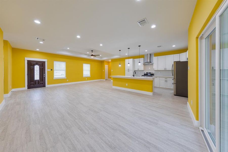 Dining room seamlessly opens to the kitchen, creating a perfect flow for entertaining and family gatherings.