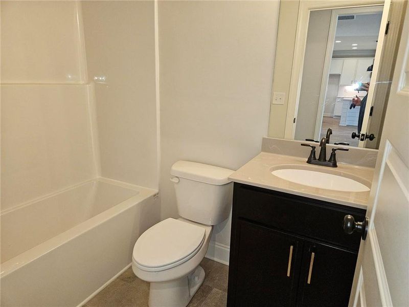 Furnished interior view inside a new home in Calgary Downs, Winder (Image 7).