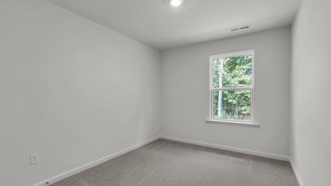 Spacious, unfurnished interior of a new home in The Townes at Bexford, Willow Spring (Image 20). Spacious, unfurnished interior of a new home in The Townes at Bexford, Willow Spring (Image 20).