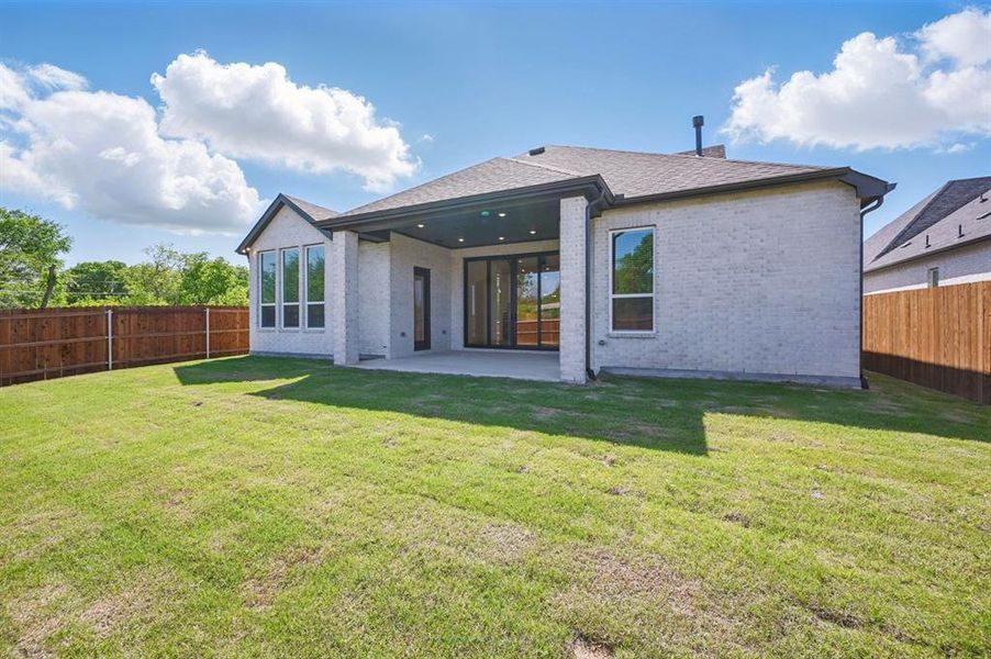 Exterior details and patio area of a home in Dove Hollow, Waxahachie (Image 2). Exterior details and patio area of a home in Dove Hollow, Waxahachie (Image 2).
