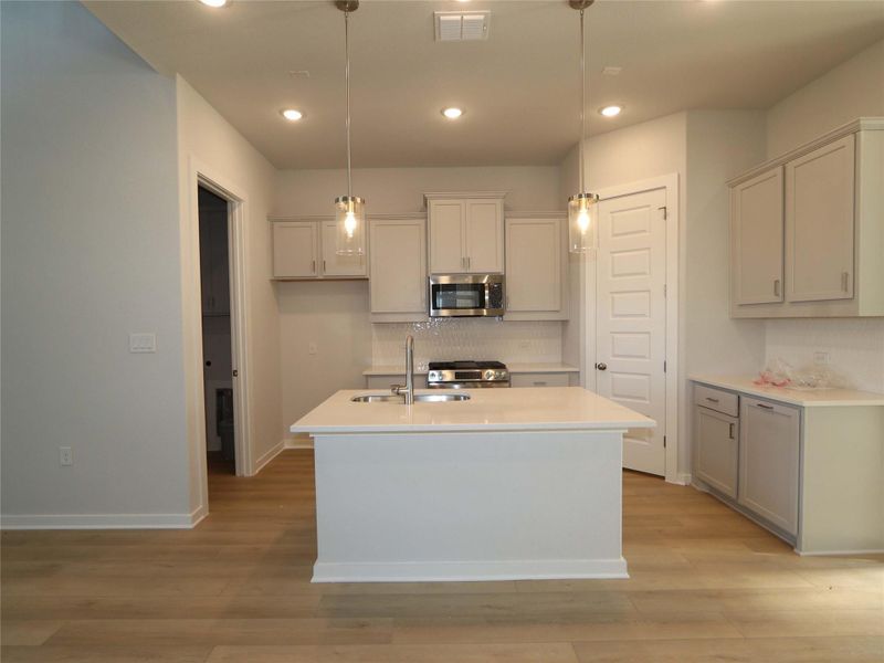 Furnished interior view inside a new home in Estancia West, Manchaca (Image 7). Furnished interior view inside a new home in Estancia West, Manchaca (Image 7).