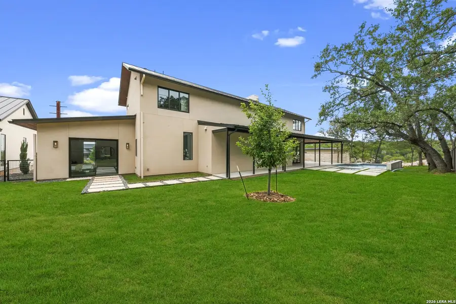 Exterior details and patio area of a home in , New Braunfels (Image 29).