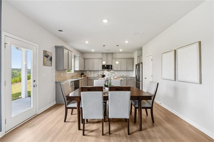 Furnished interior view inside a new home in The Hills at Cedar Creek, Winder (Image 12).