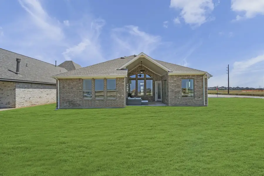 Representative exterior details of a home built from the Bradford by Chesmar Homes in Meridiana 50's, Manvel (Image 3).