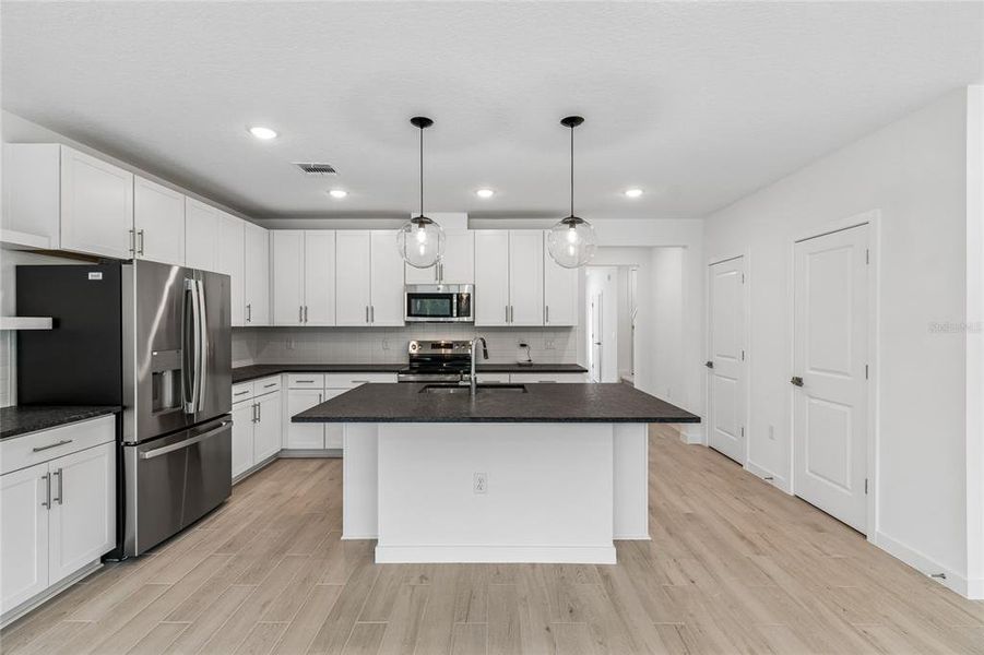 Furnished interior view inside a new home in Aspire at Canter Creek, Davenport (Image 5).