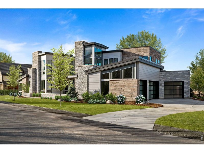 Front exterior of a new home in , Cherry Hills Village, CO, highlighting curb appeal (Image 2). Front exterior of a new home in , Cherry Hills Village, CO, highlighting curb appeal (Image 2).
