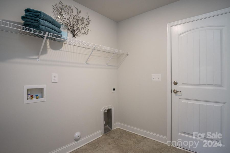 Mudroom/Laundry. Photo representation. Colors and options will differ.