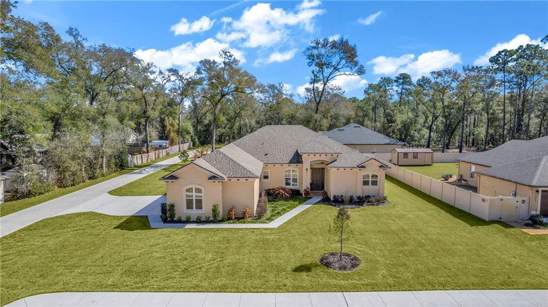 Front exterior of a new home in , Orange City, FL, highlighting curb appeal (Image 20).