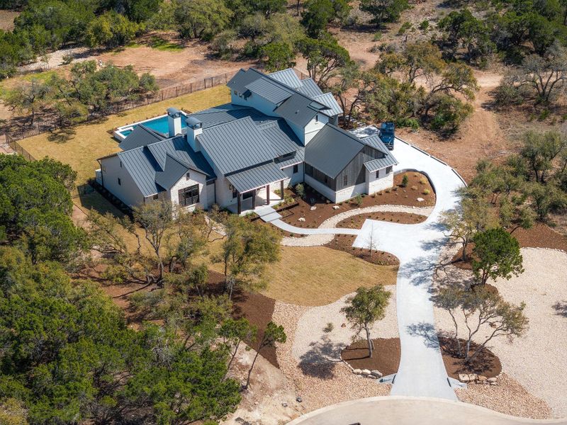 Aerial view of home-perfectly tucked in the trees!