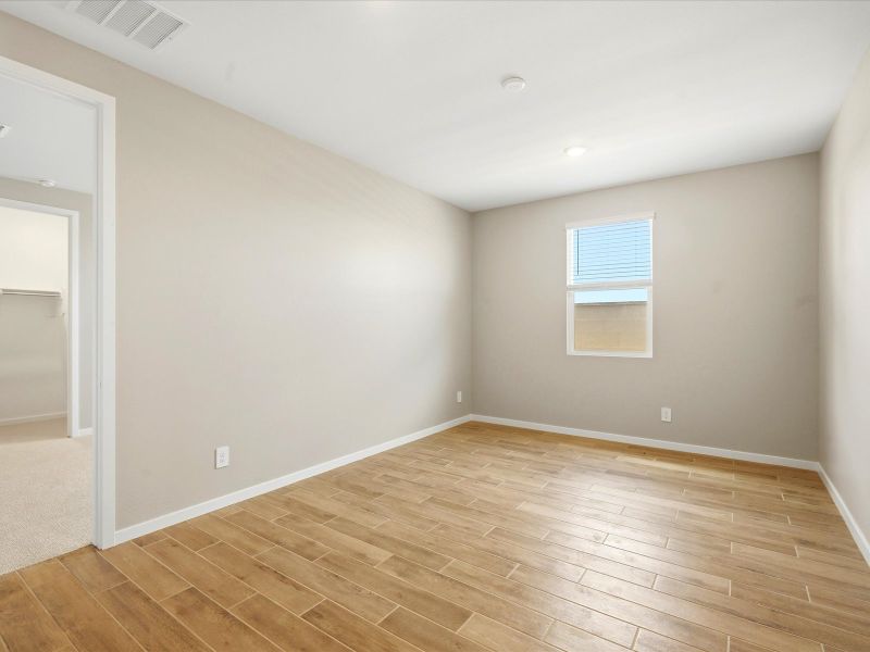 Spacious, unfurnished interior of a new home in Blossom Rock Signature Series, Apache Junction (Image 12).
