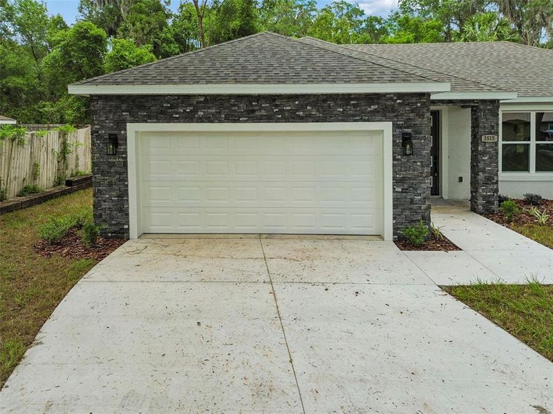 Front exterior of a new home in , Deland, FL, highlighting curb appeal (Image 24).