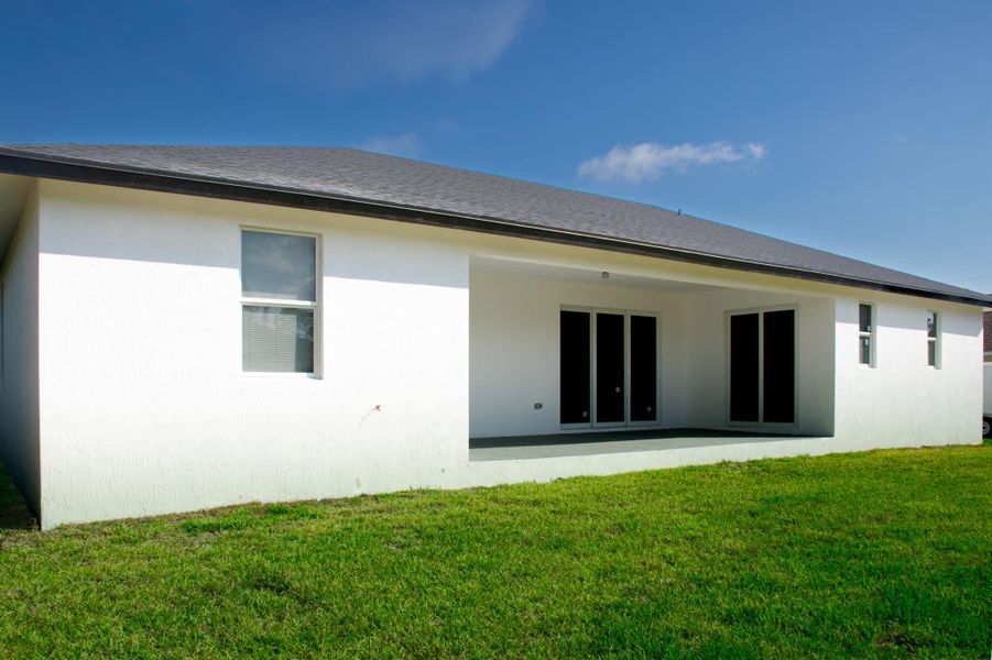 Front exterior of a new home in , Port Charlotte, FL, highlighting curb appeal (Image 25).
