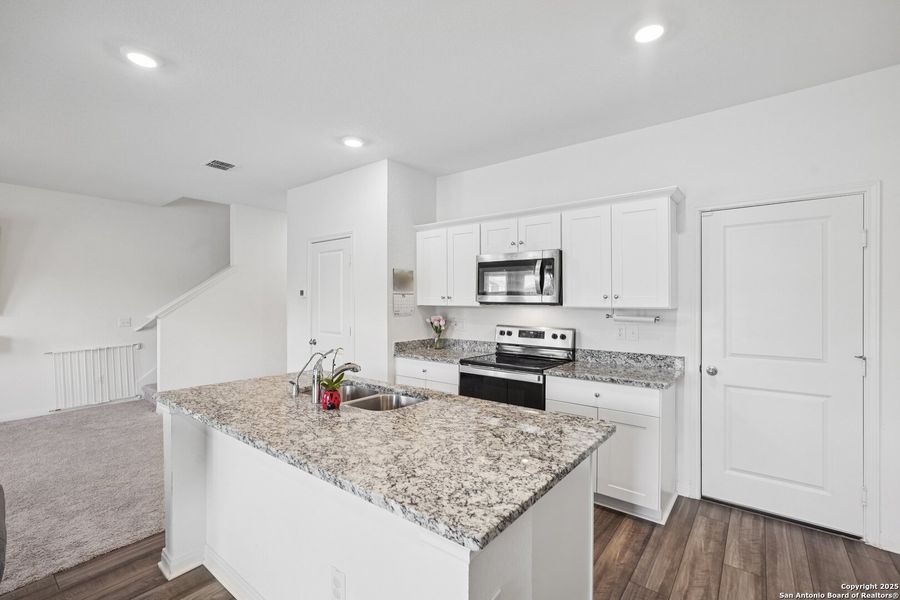 Furnished interior view inside a new home in Sutton Farms, San Antonio (Image 30). Furnished interior view inside a new home in Sutton Farms, San Antonio (Image 30).